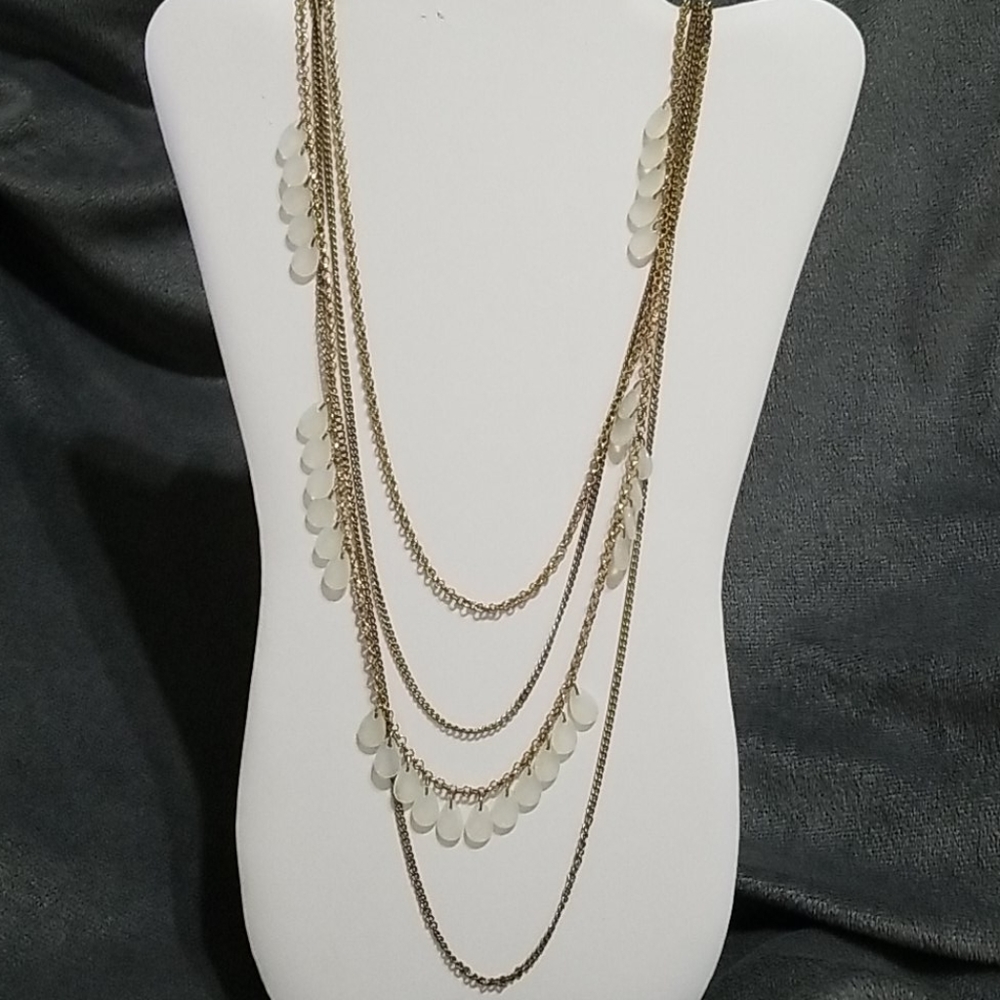 Four Strand Gold Beaded Necklace.